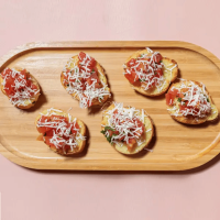 Bruschetta with olives, sweet corn, pomodorini