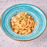 Shrimp, zucchini and tomato tagliatelle
